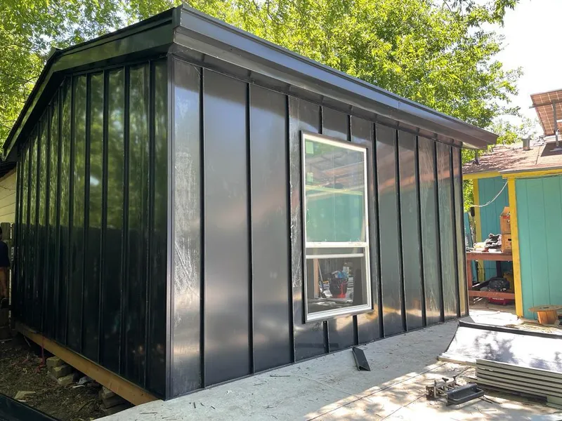 Black standing seam metal wall panels for Roof Inspection in Damascus